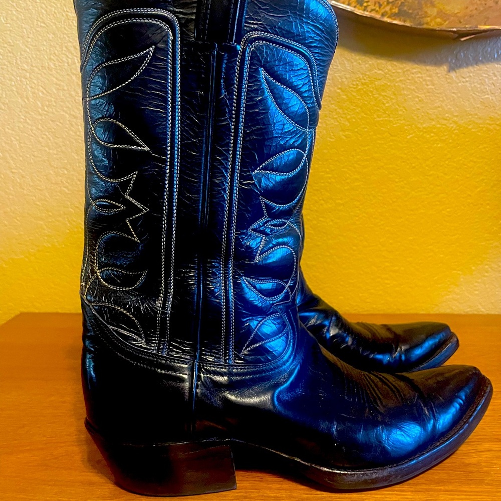 Shiny black cowboy boots
